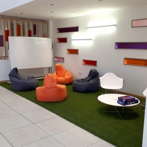 artificial grass used in a commercial workspace for an employees rest area